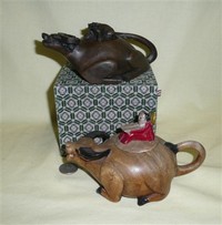Two Chinese stone water buffalo teapots