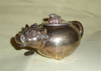 Chinese rotund metal cow teapot with water buffalo on lid