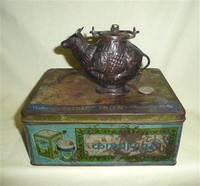 Brass Nandi Holy water pot on metal shipping box