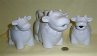 Heavy older ceramic white cow teapot set