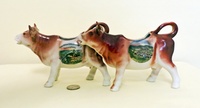 Hohensyburg and Triberg souvenir cow creamers
