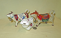 Souvenir cow creamers from Austria, Luxembourg and Switzerland