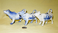 Three small german porcelaon delft cow creamers