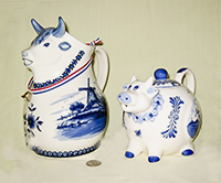 Large Delft Cow pitcher and Delst round cow teapot