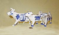 Three Souvenir Delft-like cow creamers