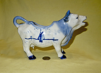 Large stout Delft cow creamer, right