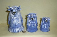 Three sizes of S&V blue lady in a dress cow creamers