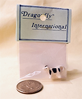 Dragonfly cow creamer in package