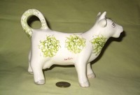 Eve Taylor white cow creamer with green flowers