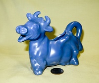 Dark blue Dryden cow caricature creamer