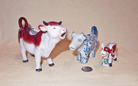 Realistic and fanciful cow creamers