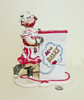 Judy Lotus Cow in red dress holding milk carton container, front