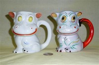 2 Japanese cow caricature pitchers