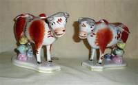 Pair of Victorian cow creamers withy milkmaids