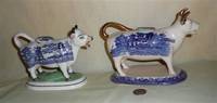 Two Blue Willow transfer printed cow creamers, right