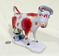 Victorian cow creamer with milkmaid