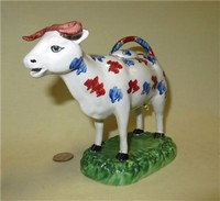 Swansea Cambrian cow creamer with brown horns
