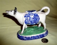 Cow creamer with circular oriental transfer print