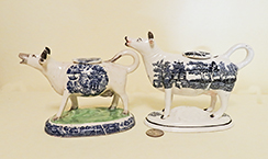 2 Blue Willow teransfer printed cow creamers, left