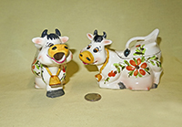 Cow creamer and sugar with flowers and yellow noses